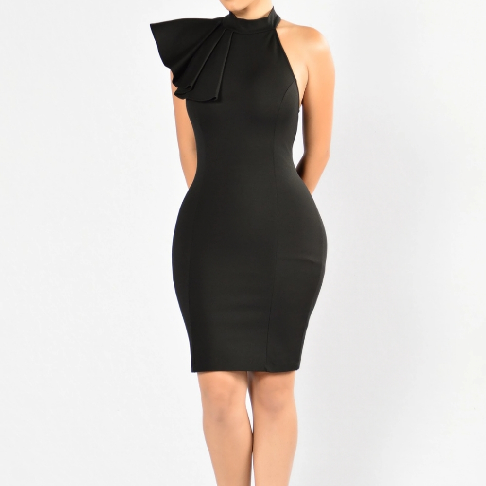 Black Fitted Dress with ruffle detail. Worn once.